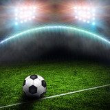 Nočný futbalový zápas v dynamickom svetle
