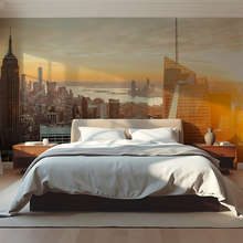 Panorama-mesta-ve-zlatem-svetle-zapadu-slunce-fototapety-architektura-fototapety-demural